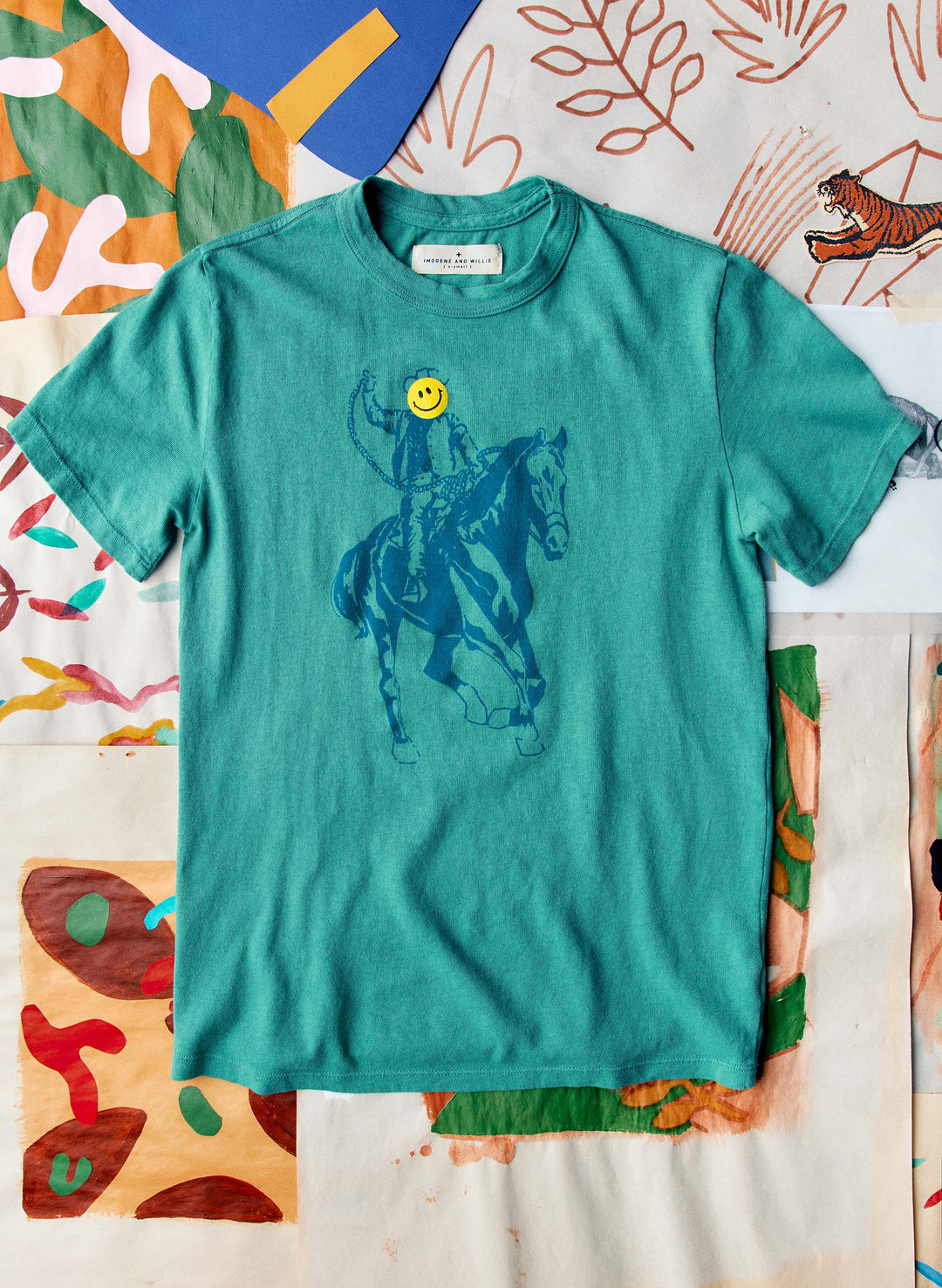 a blue shirt with a horse on it
