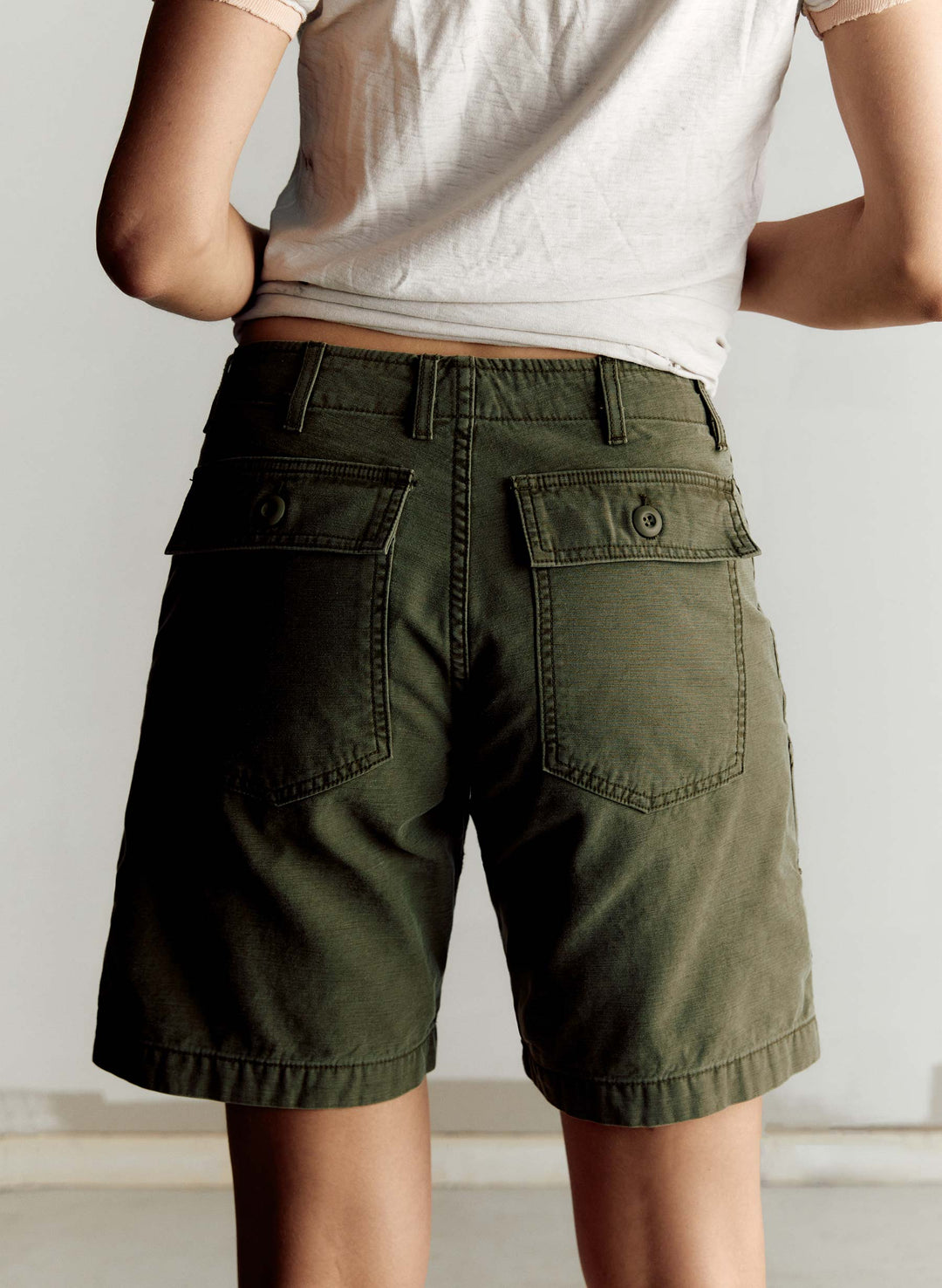 a person wearing green shorts