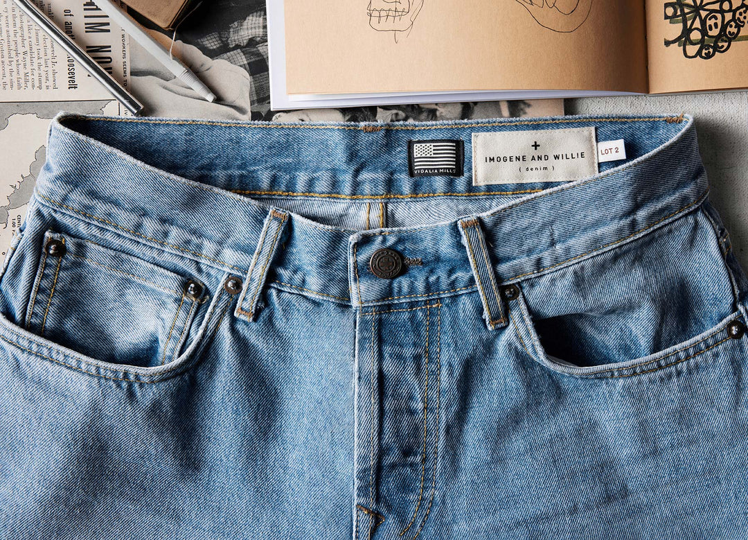a pair of jeans with a pocket