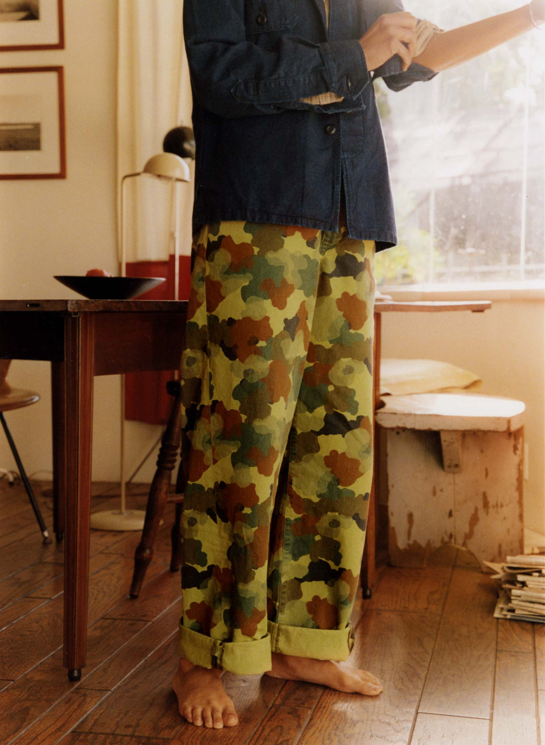 a person in a camouflage pants