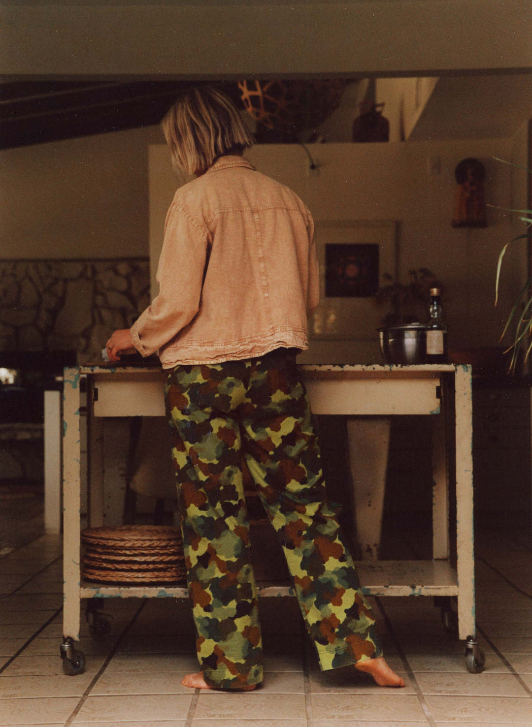a person standing in a kitchen