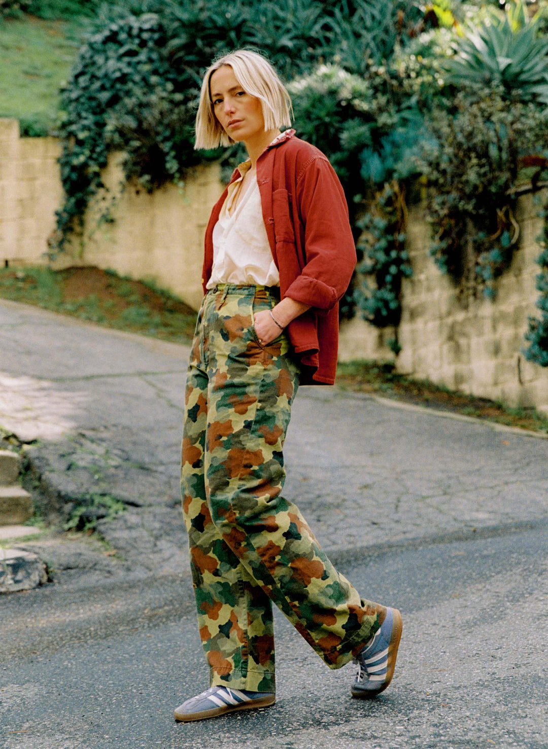 a woman in a red jacket and pants