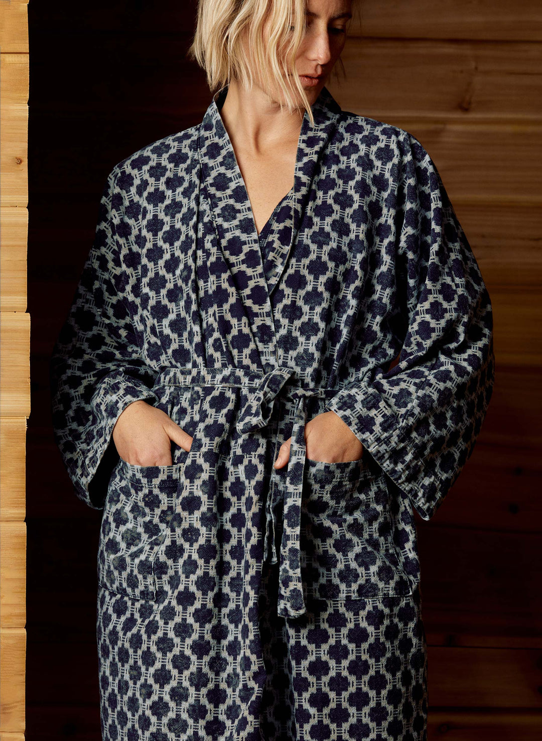 a woman wearing a robe