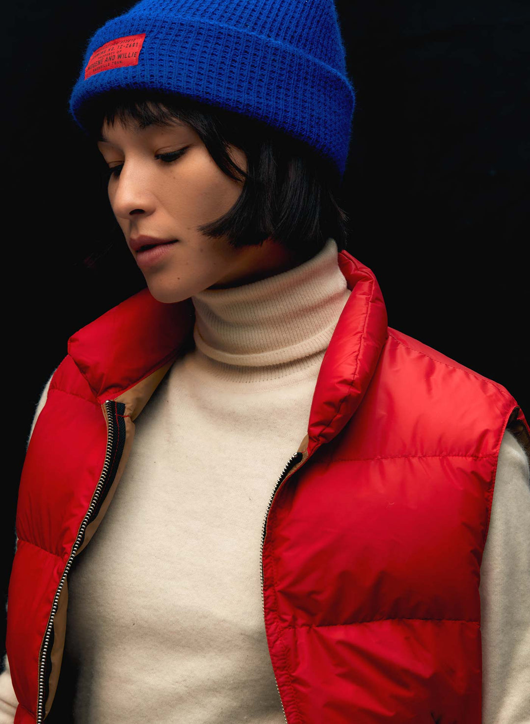 Lip, Outerwear, Neck, Textile, Flash photography, Sleeve, Cool, Red, Cap, Magenta