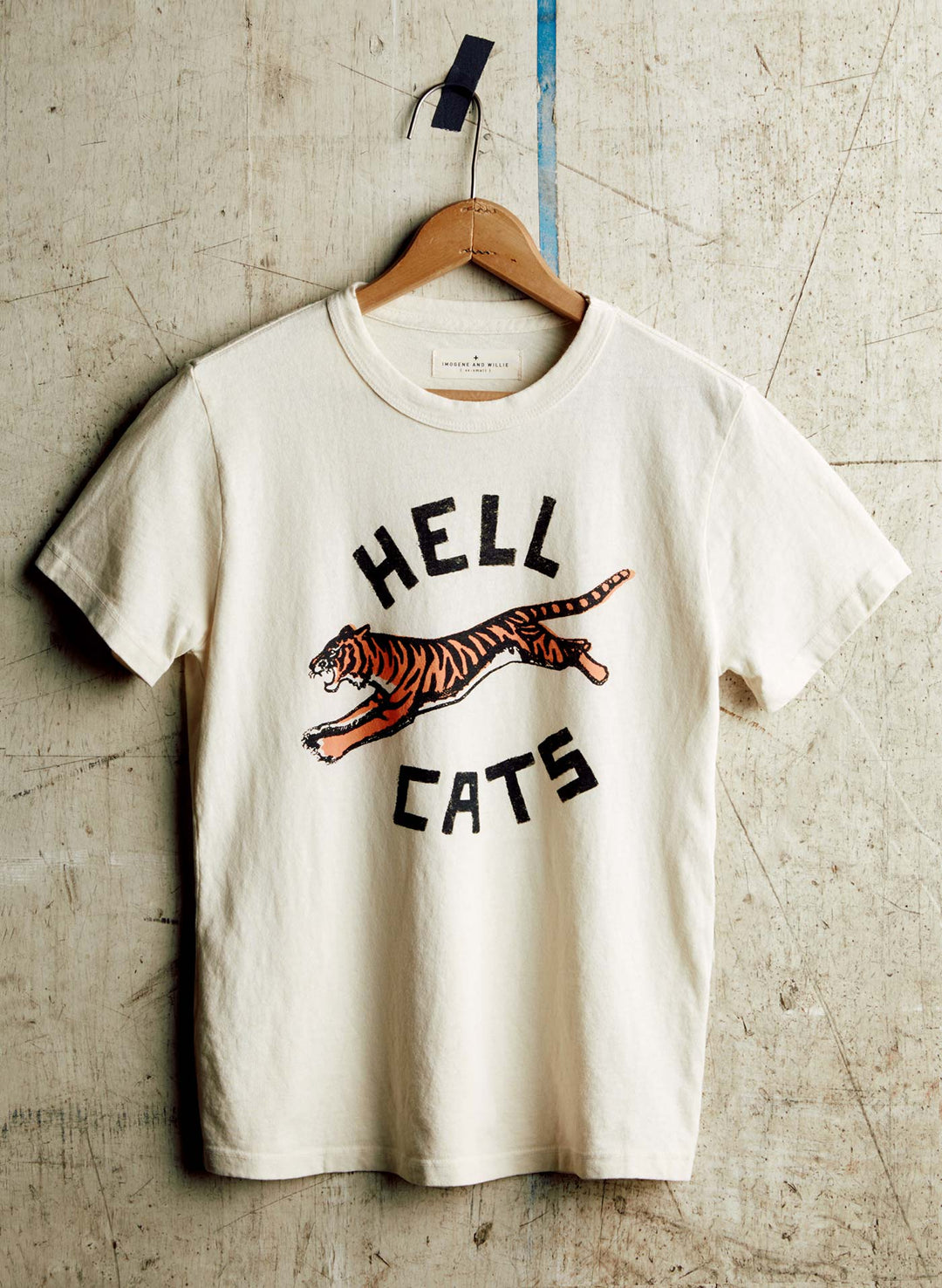 a white t-shirt with a tiger on it