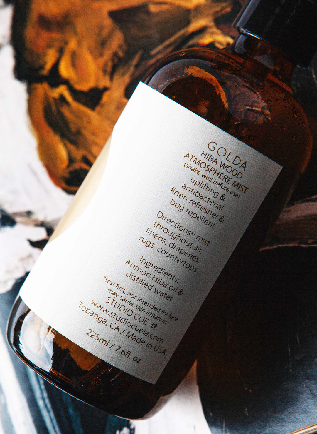 a brown bottle with white label