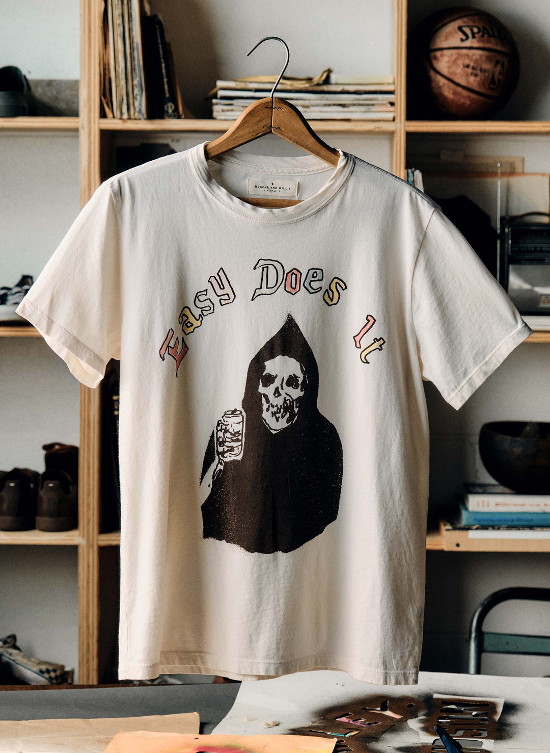 a white shirt with a skeleton on it