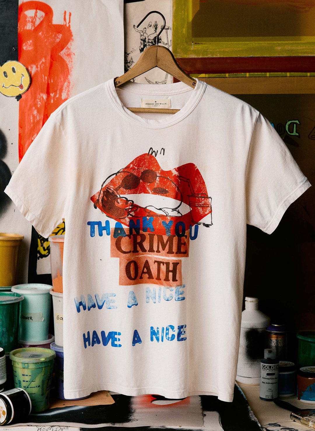 a white t-shirt with red and blue text on it