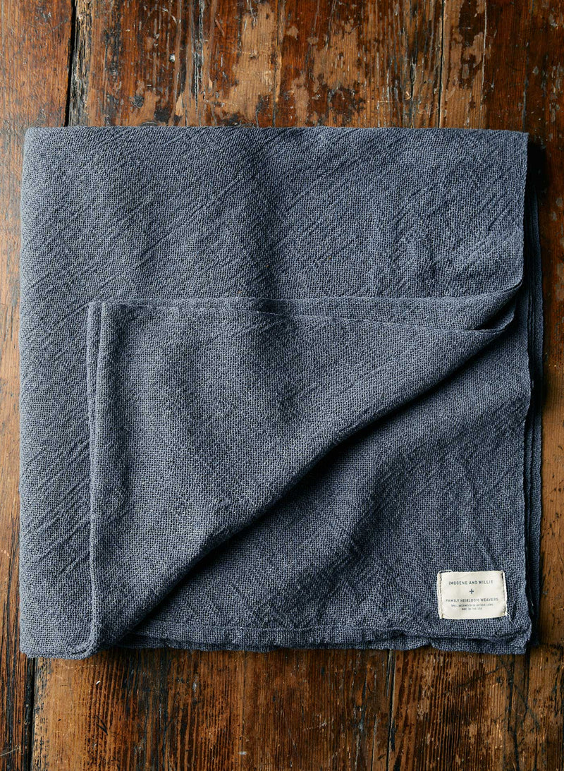 i+w x family heirloom weavers cotton throw in indigo - Model