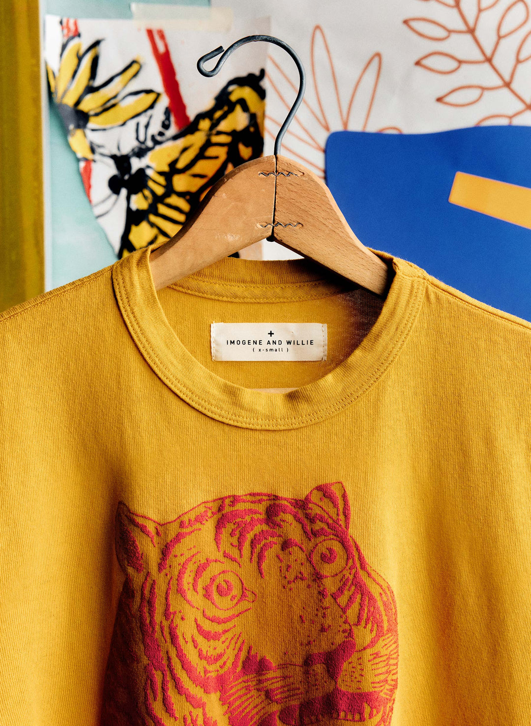a yellow sweater on a swinger