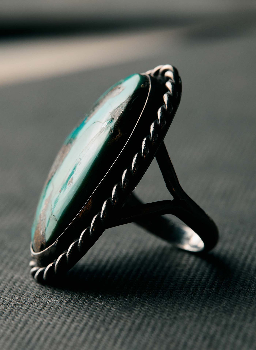 a ring with a blue stone