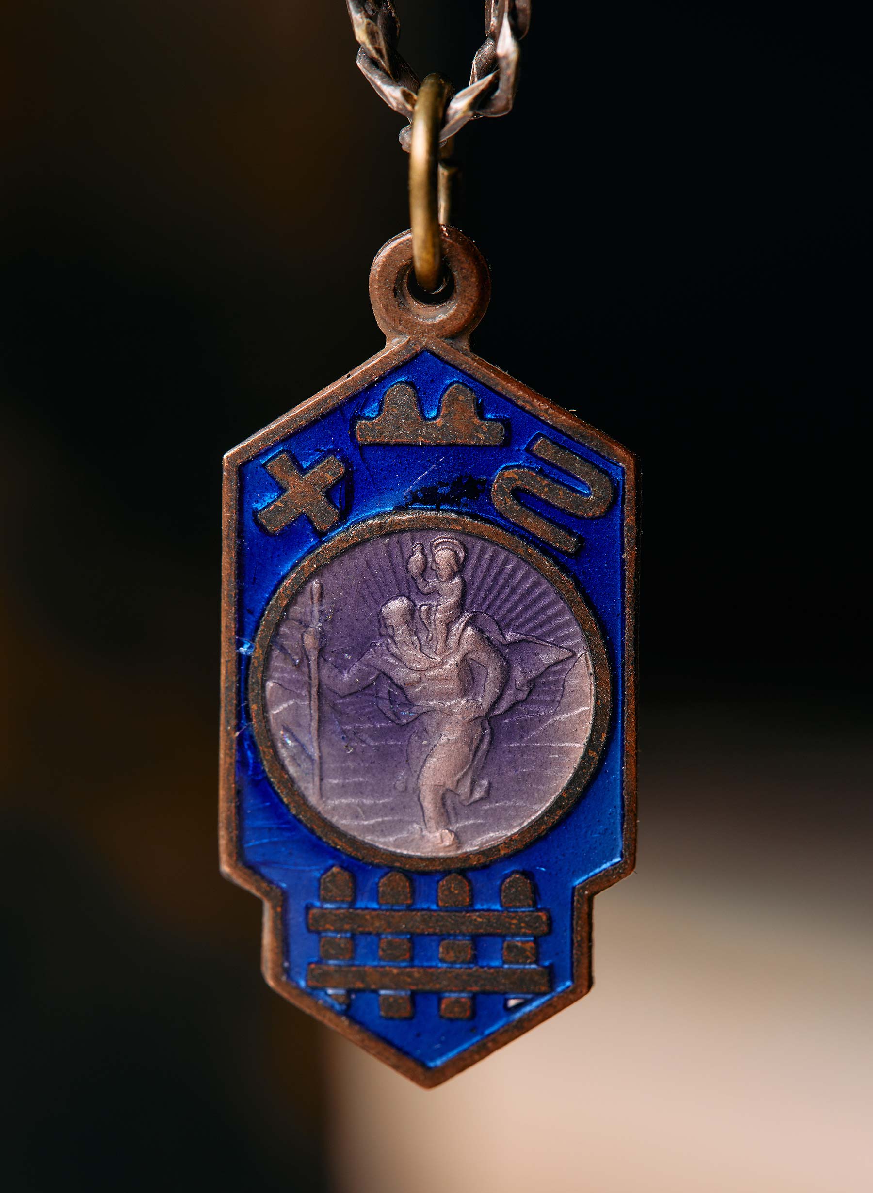 Badge, Font, Symbol, Emblem, Electric blue, Metal, Medal, Fashion accessory, Souvenir, Art