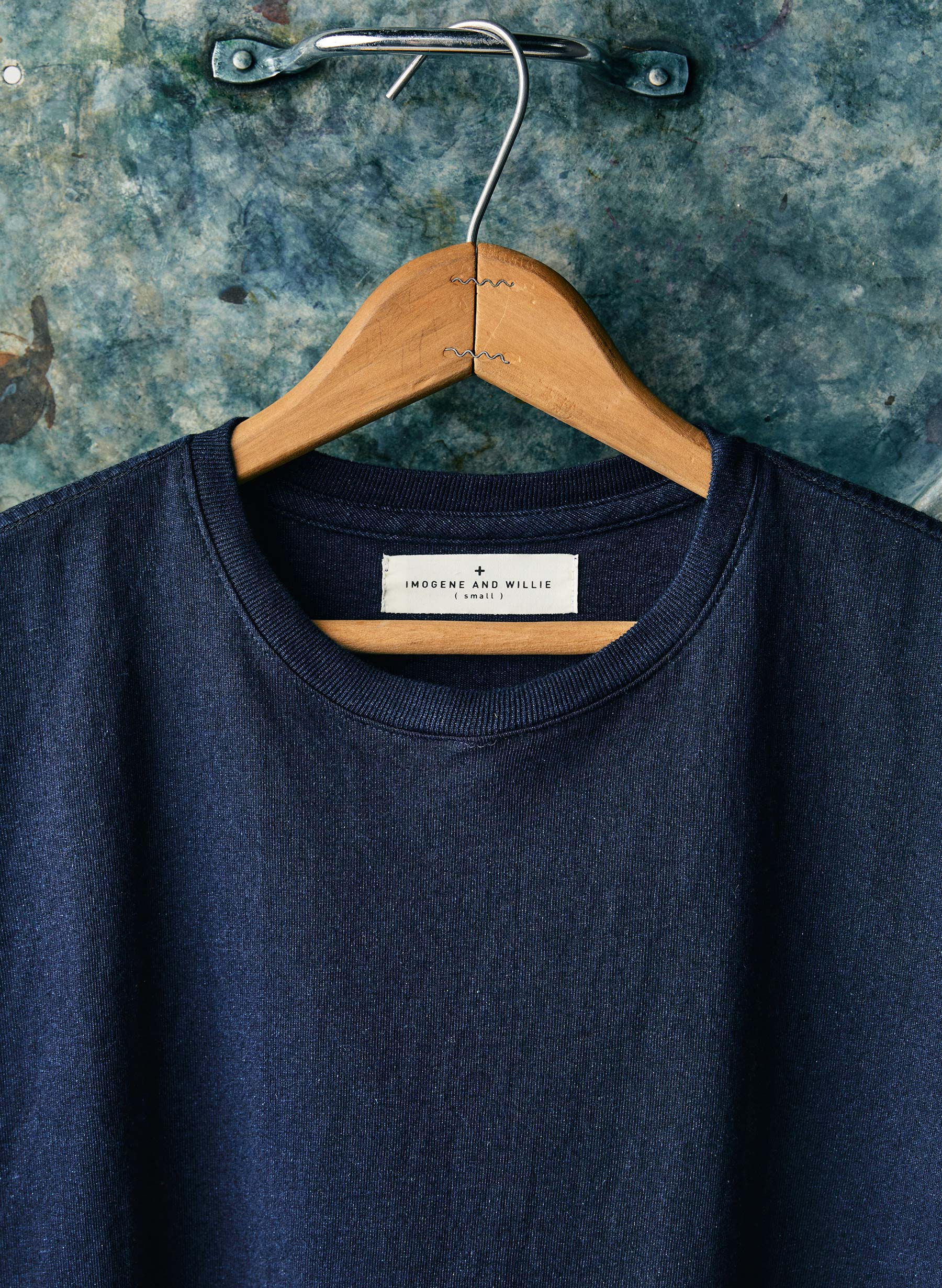 Outerwear, Neck, Sleeve, Clothes hanger, Dress shirt, Grey, Collar, T-shirt, Denim, Font