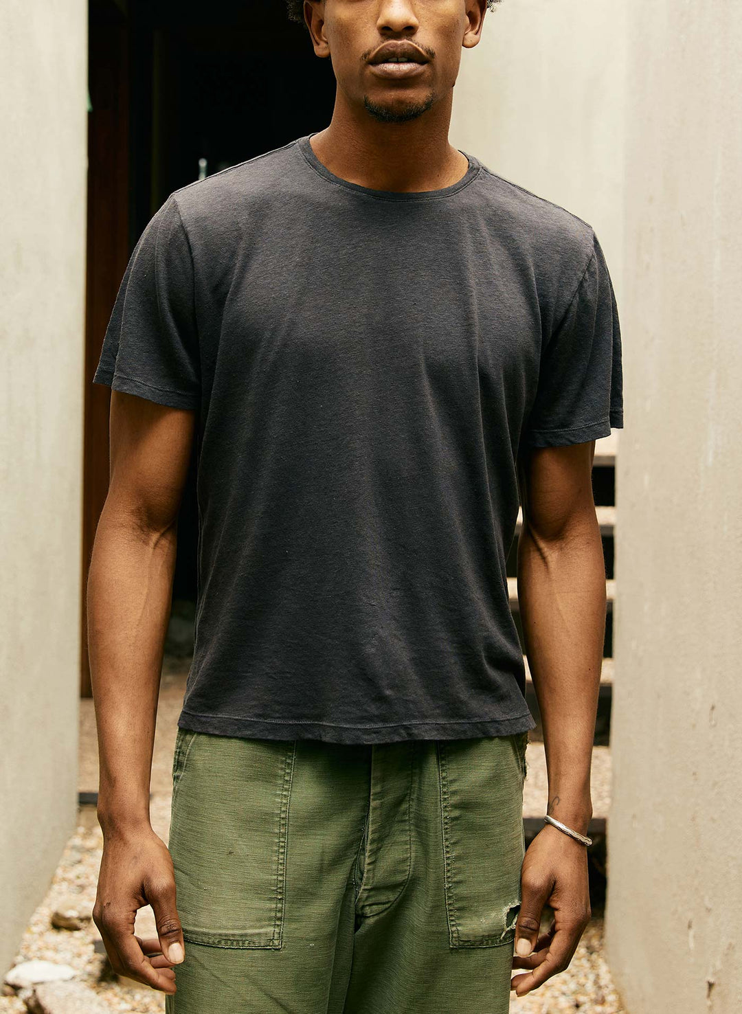 a man standing in front of a building