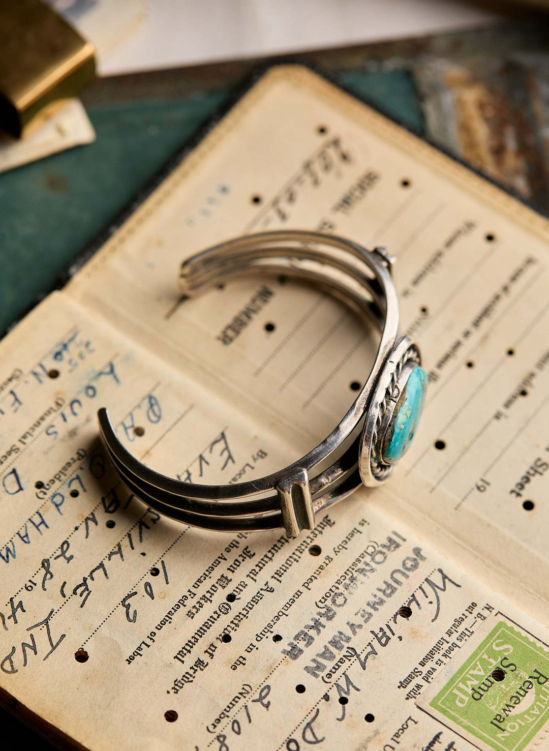 a bracelet on a book