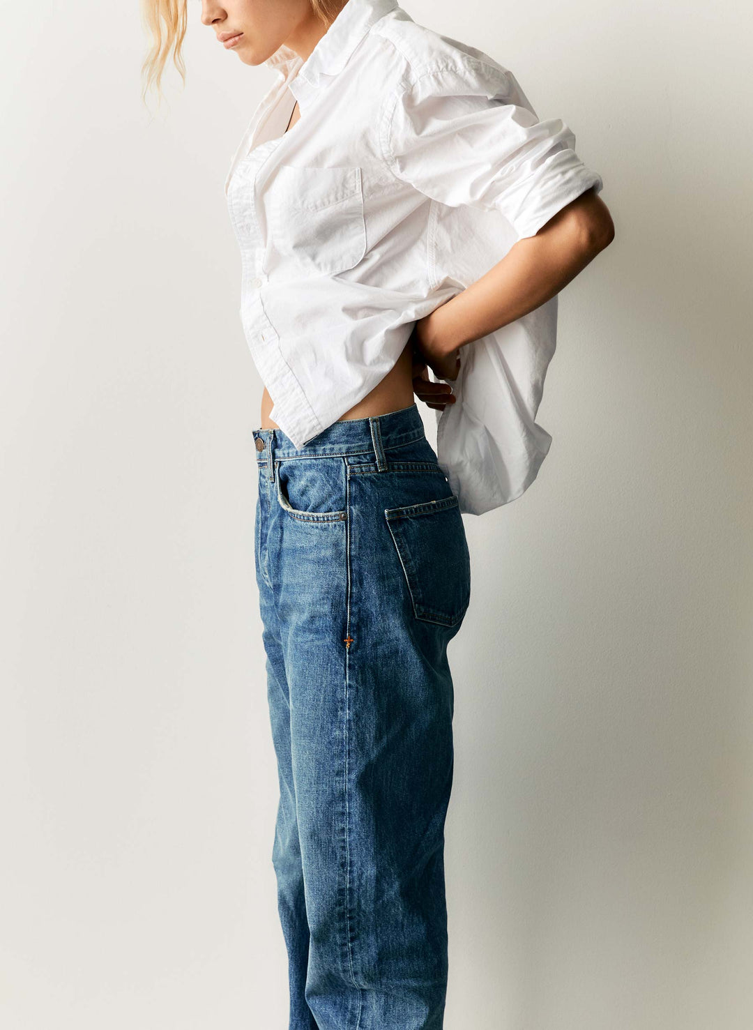 a woman in a white shirt