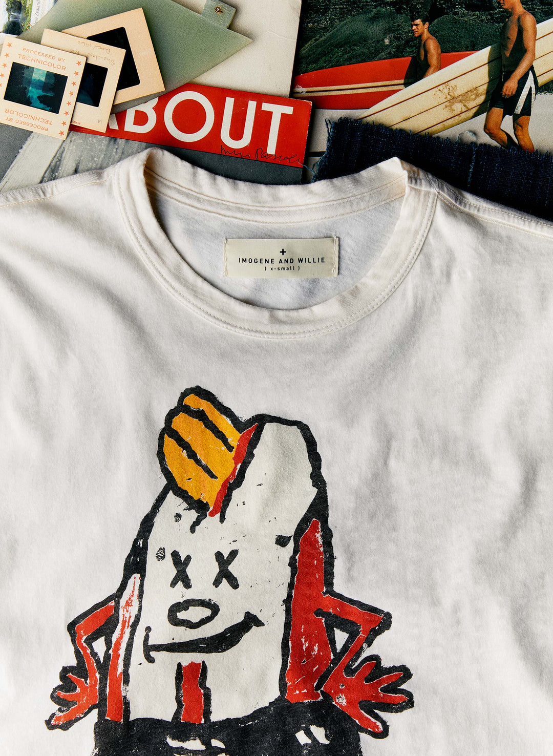 a white t-shirt with a cartoon on it