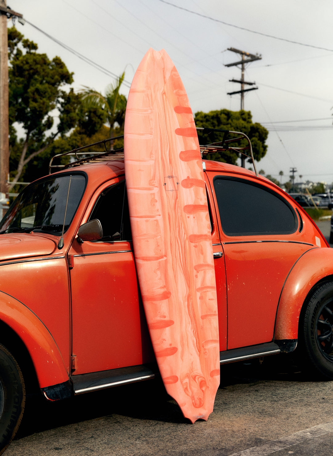 a surfboard on the car