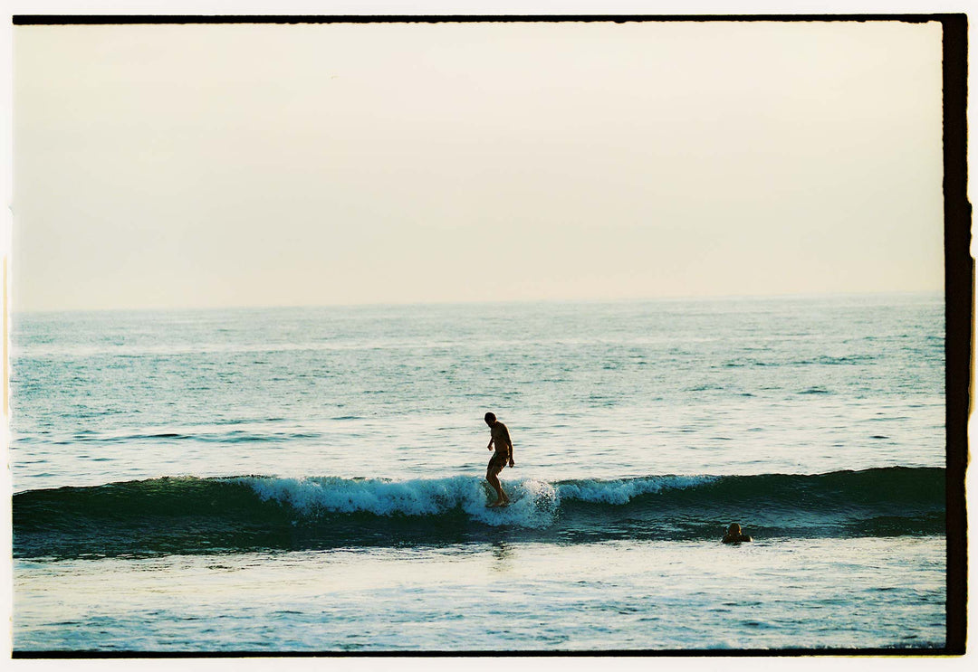 a person surfing in the ocean