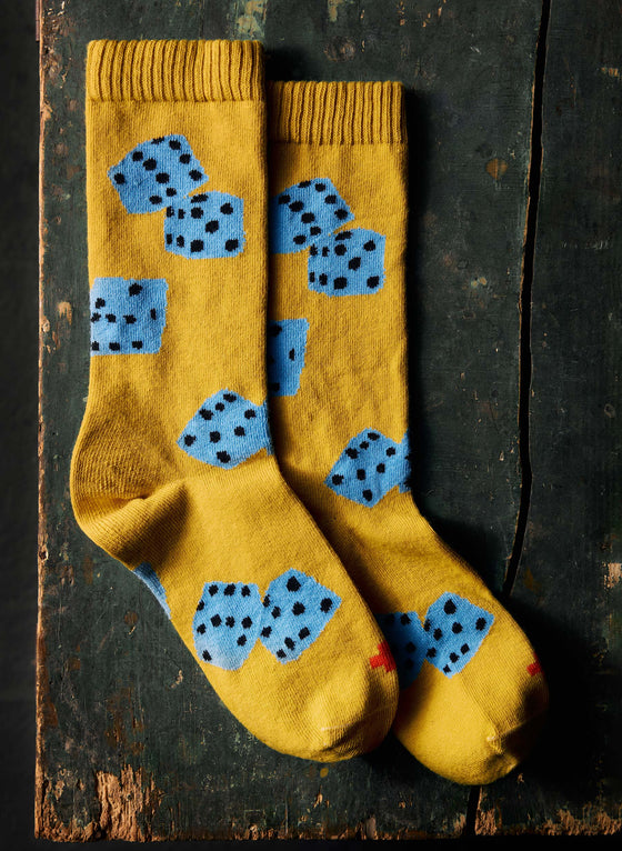 the "tumblin dice" sock in gold