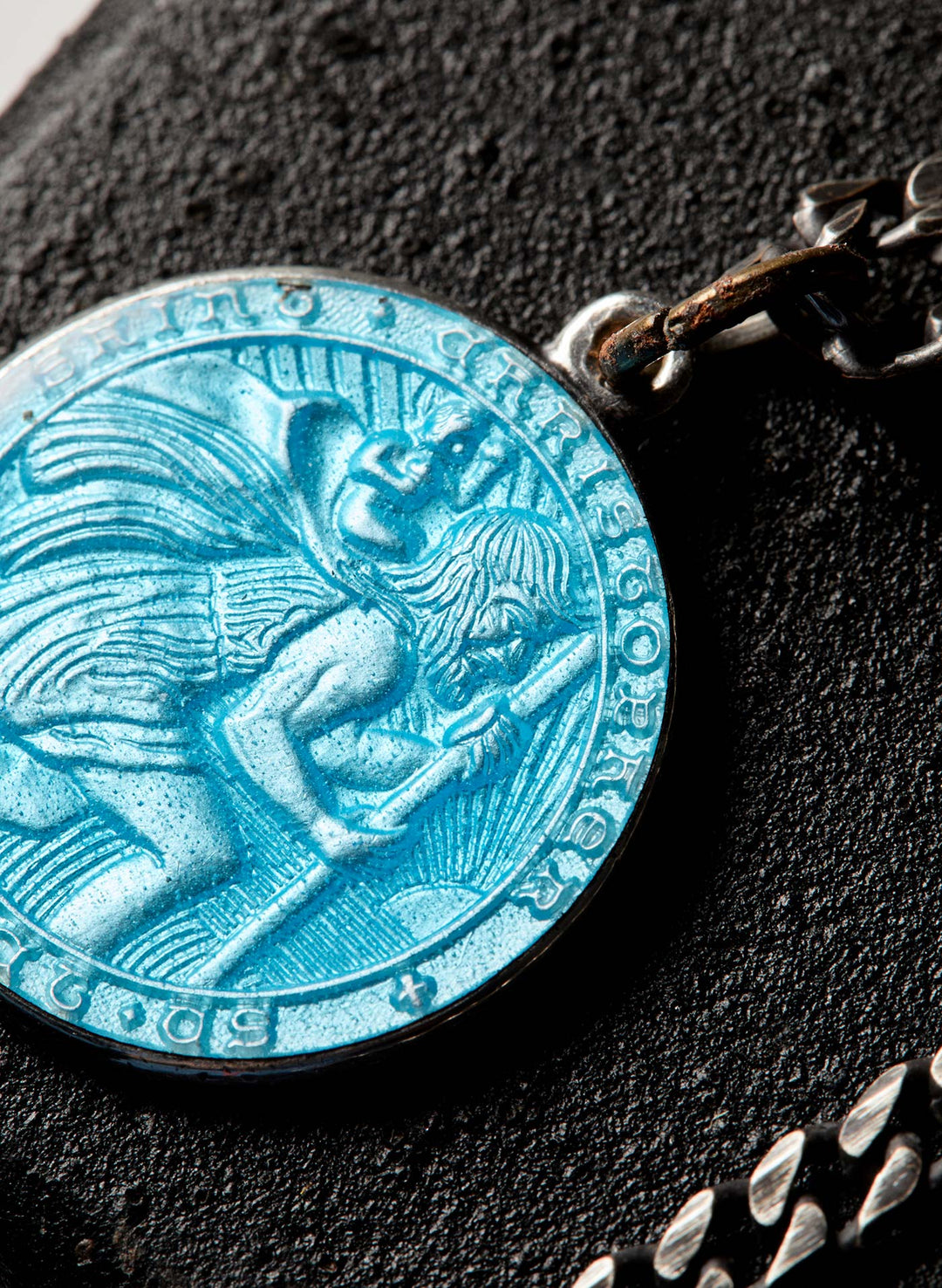 a blue medallion with a person on it