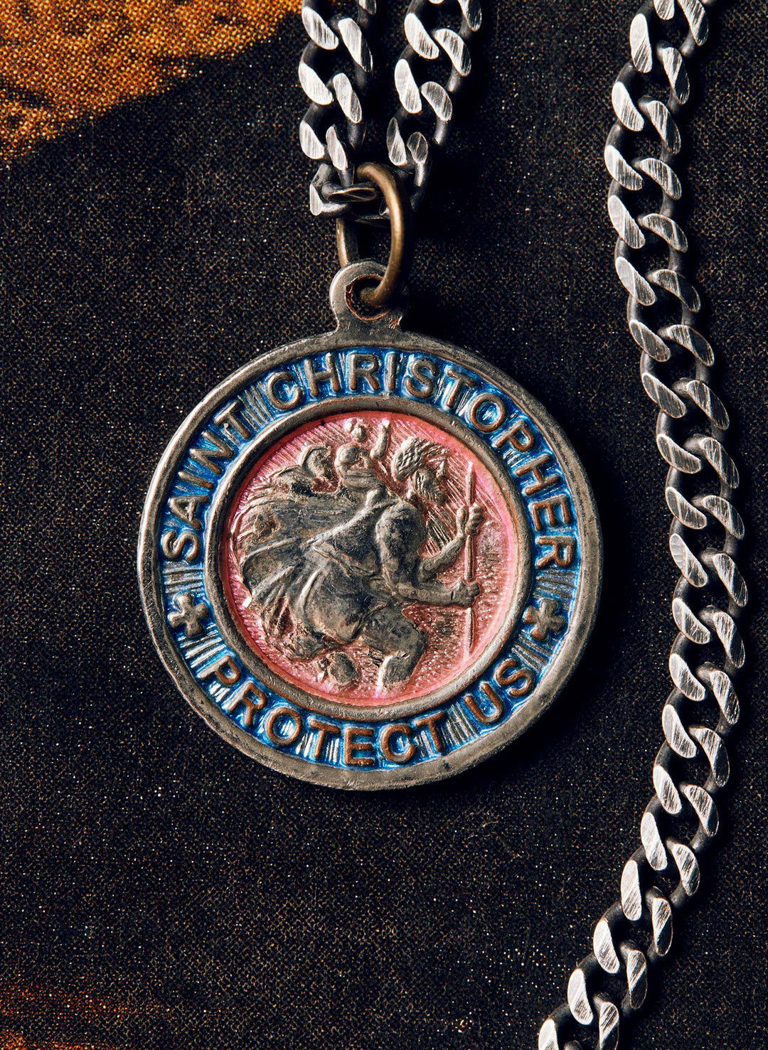 a medallion with a chain