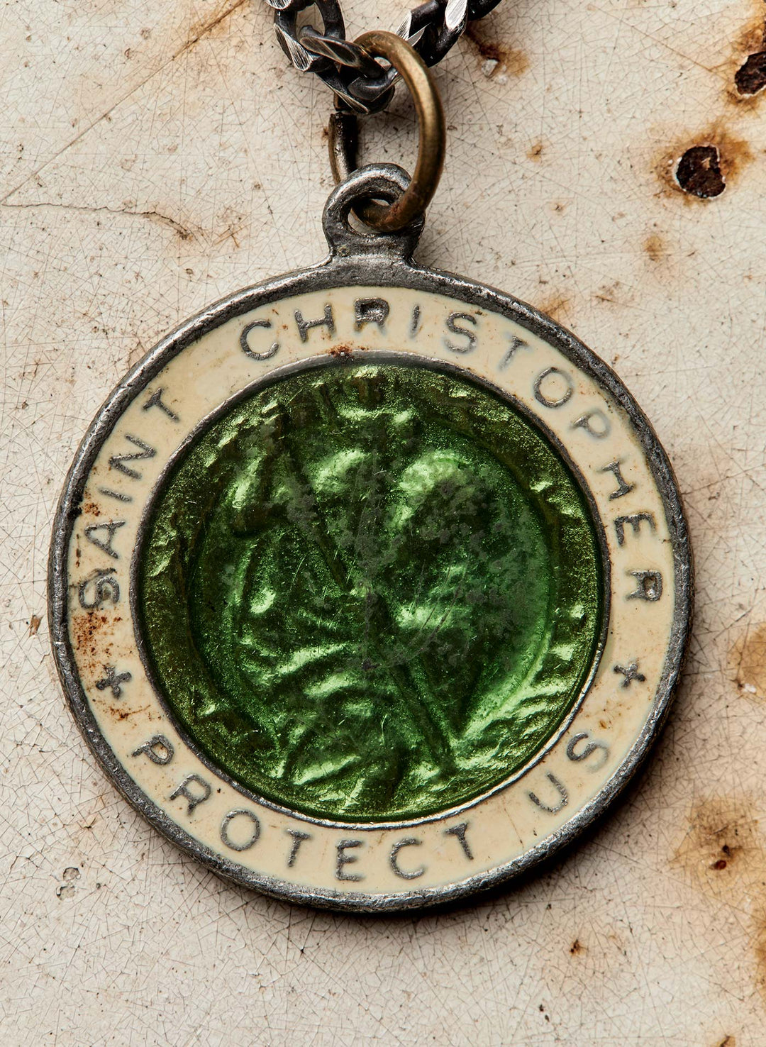 a green medallion with white text