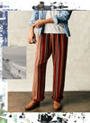 a man wearing striped pants