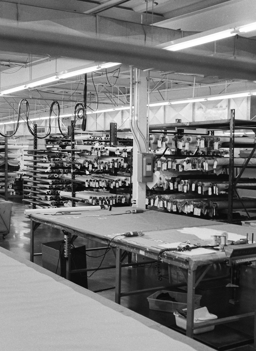 a large room with shelves of materials