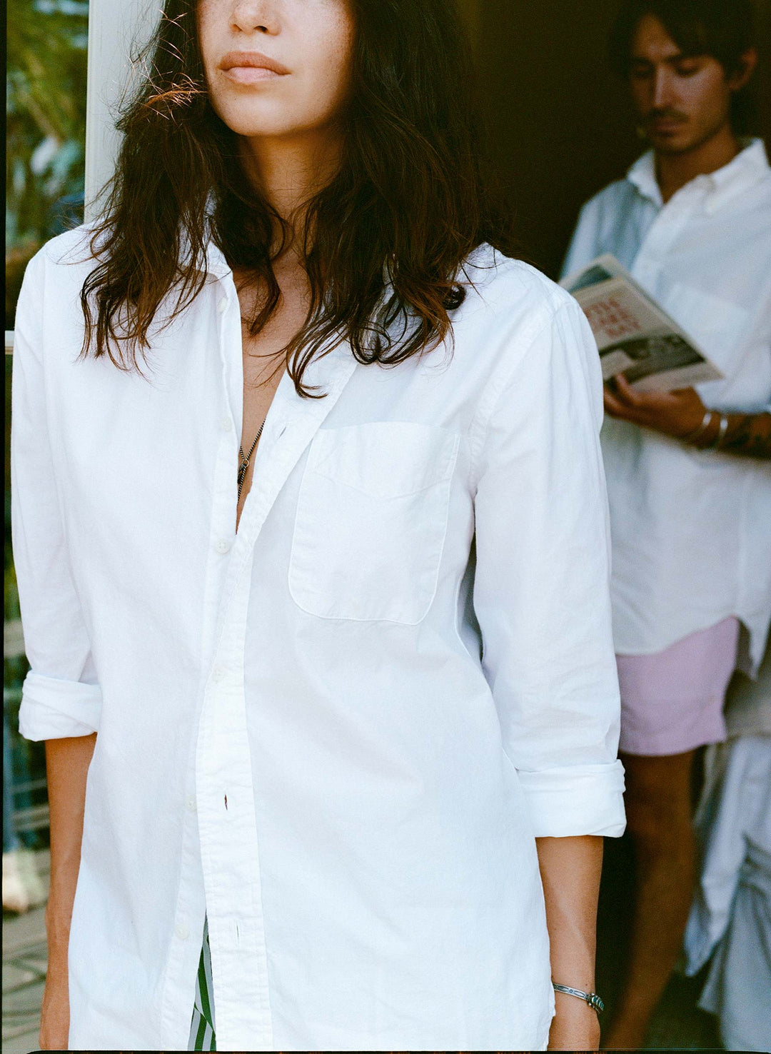 a woman in a white shirt