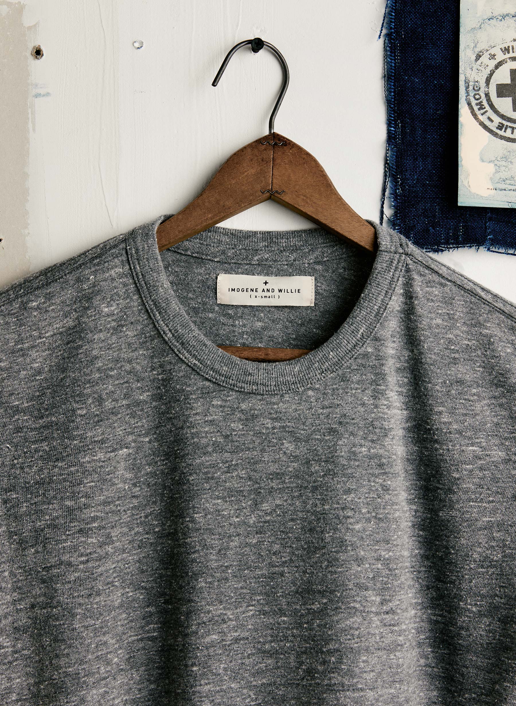 Outerwear, Neck, Sleeve, Grey, Clothes hanger, Collar, T-shirt, Font, Electric blue, Denim