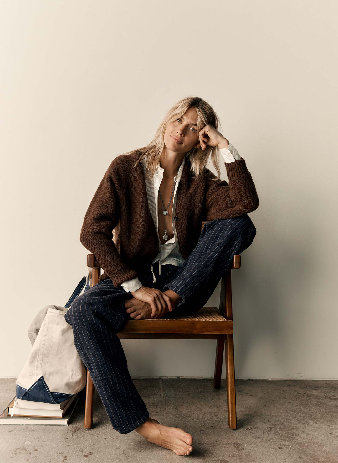 a woman sitting on a chair