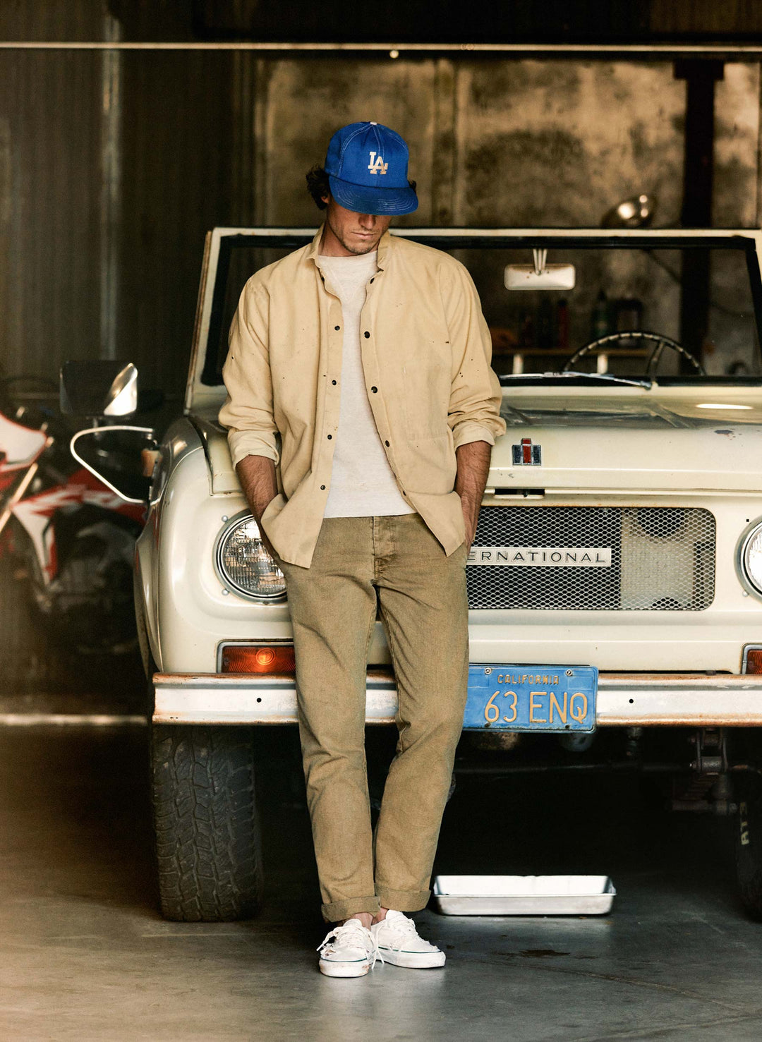 a man standing on a car