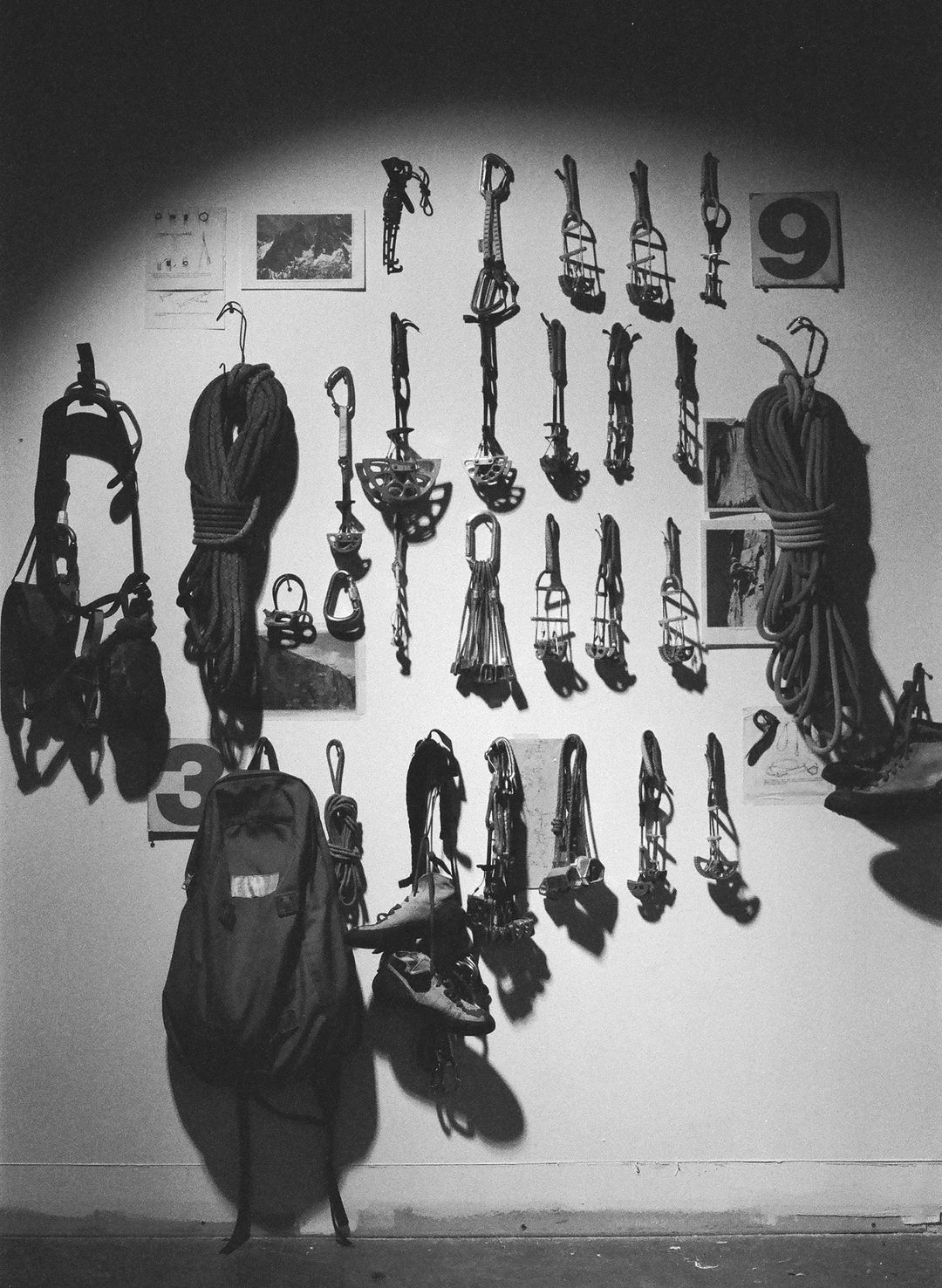 a wall with climbing equipment on it