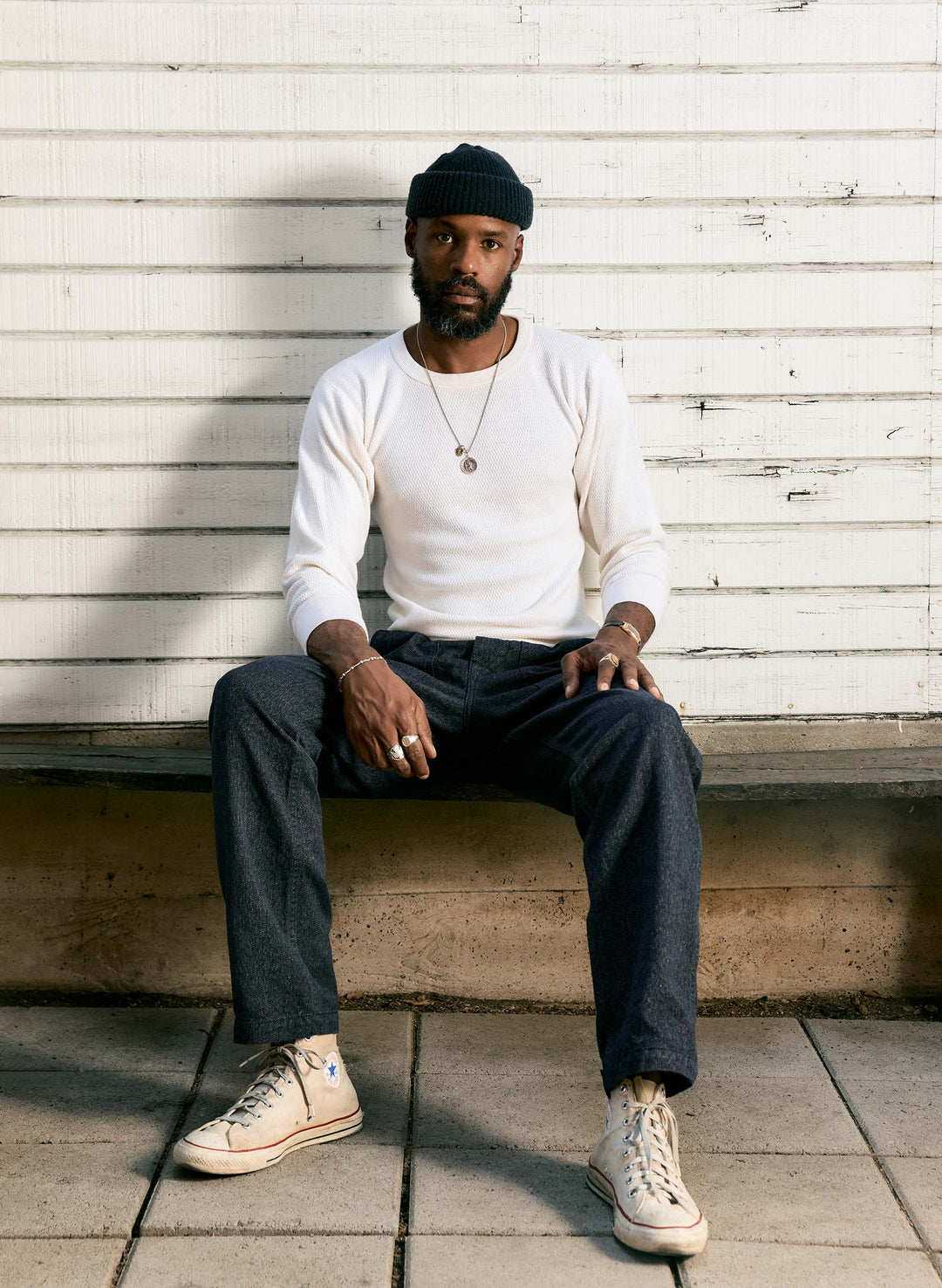 a man sitting on a bench