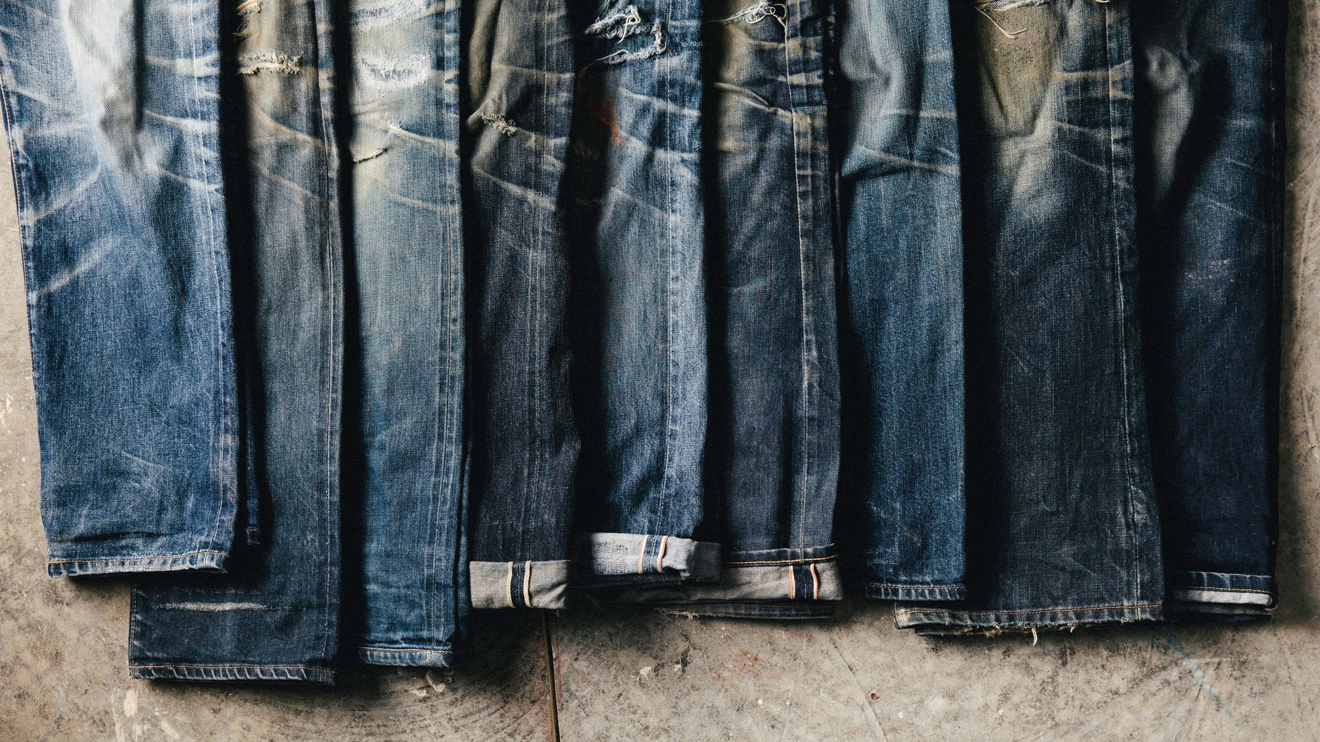 Jeans, Grey, Denim, Composite material, Rectangle, Tints and shades, Electric blue, Pattern, Font, Metal