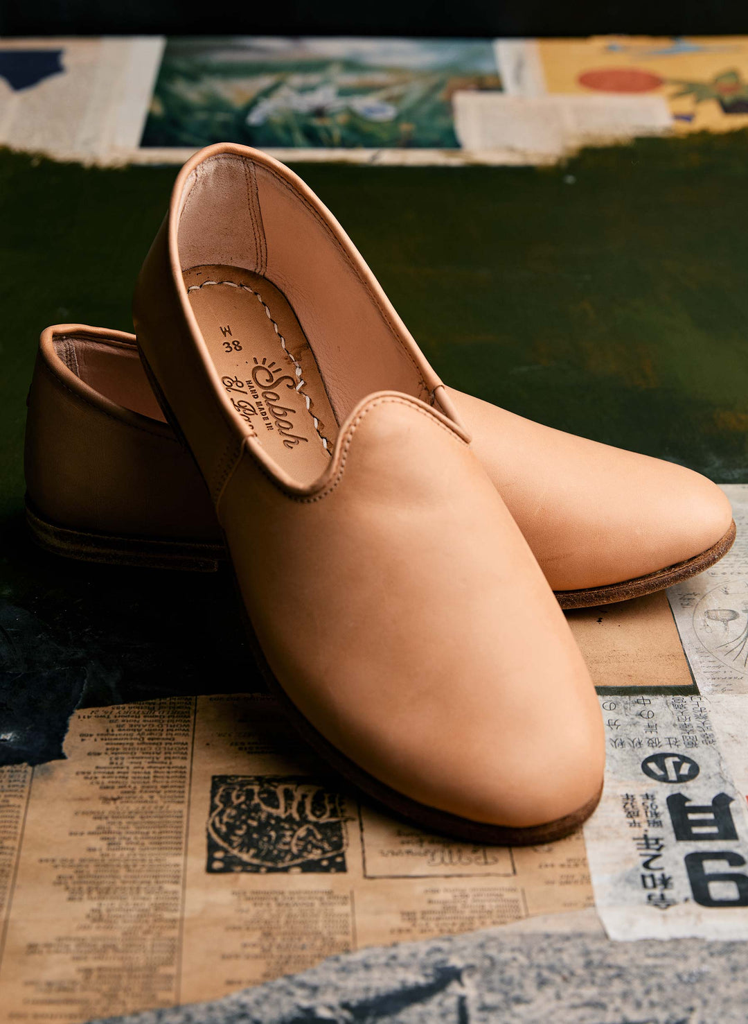 a pair of tan shoes