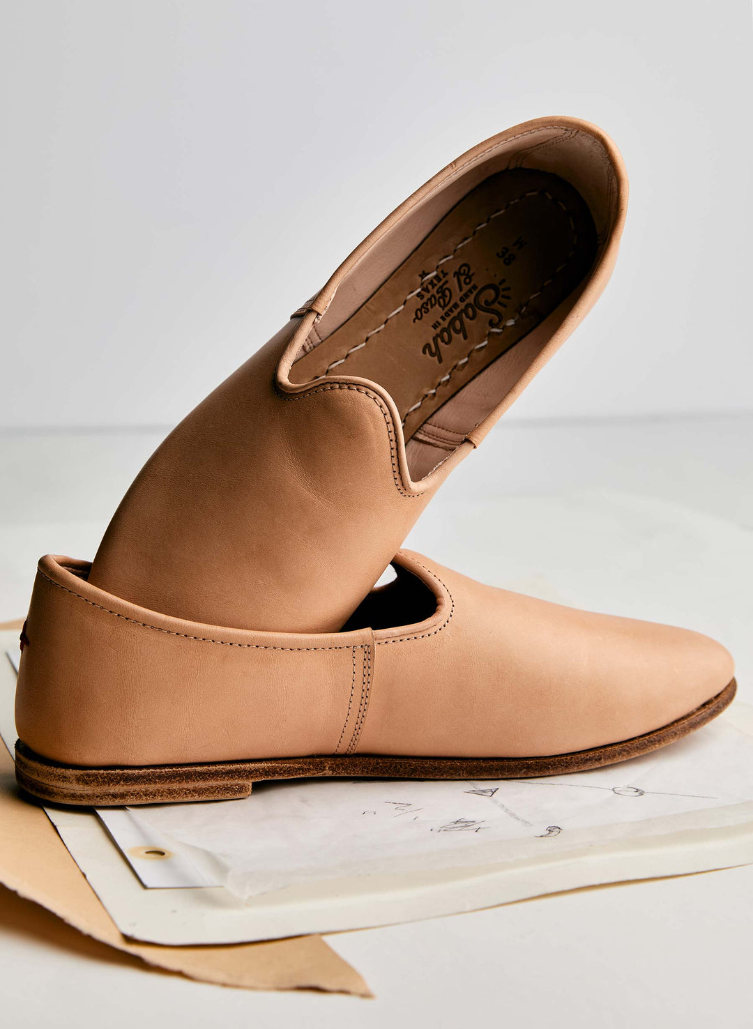 a tan slip on shoe