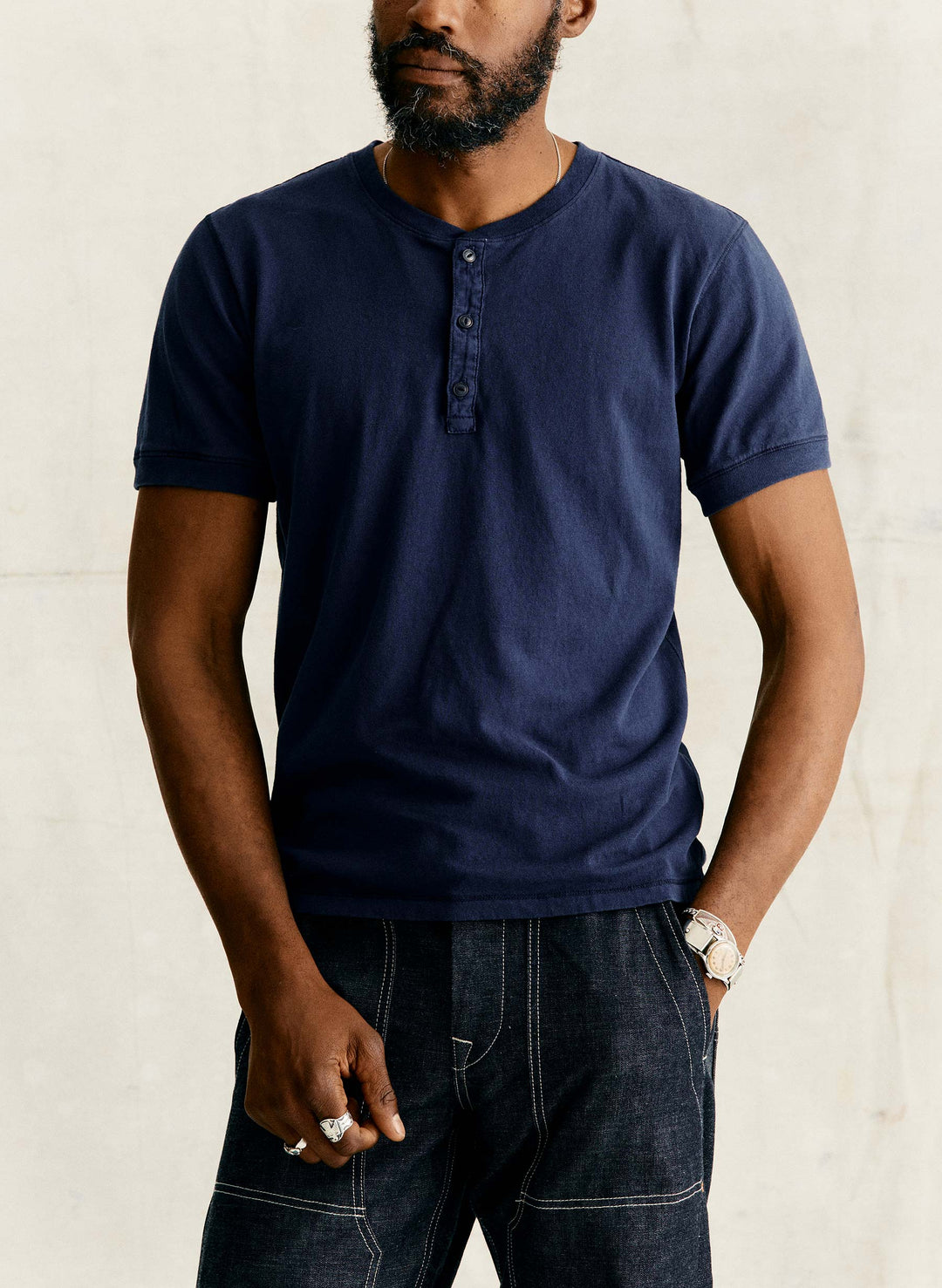 a man wearing a blue shirt