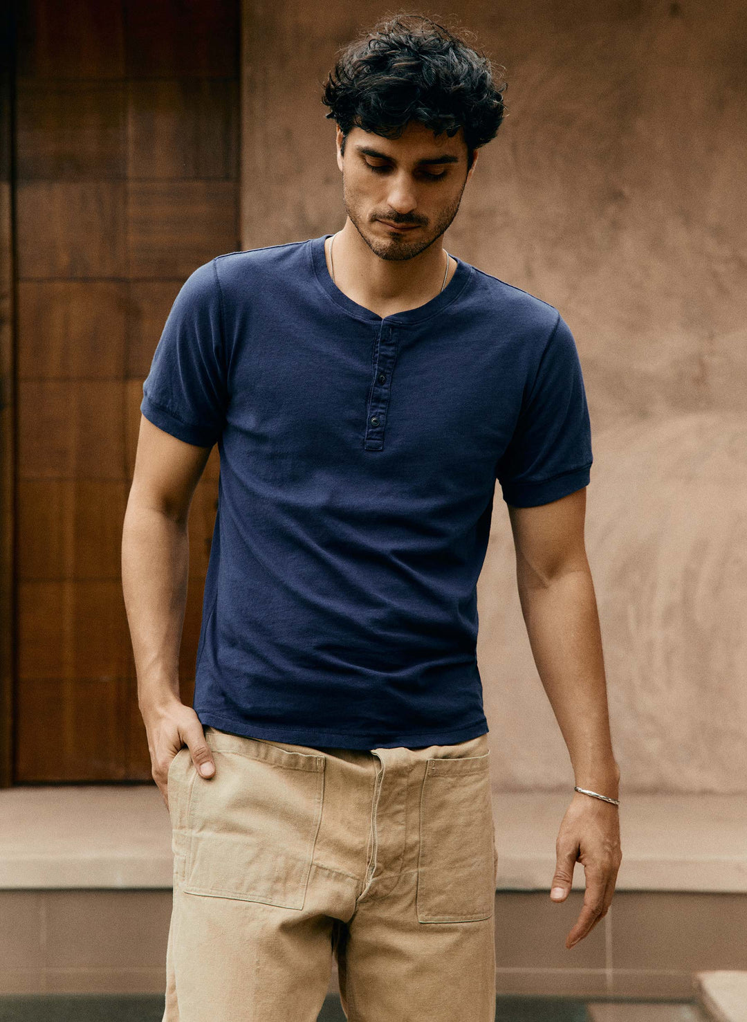 a man in a blue shirt