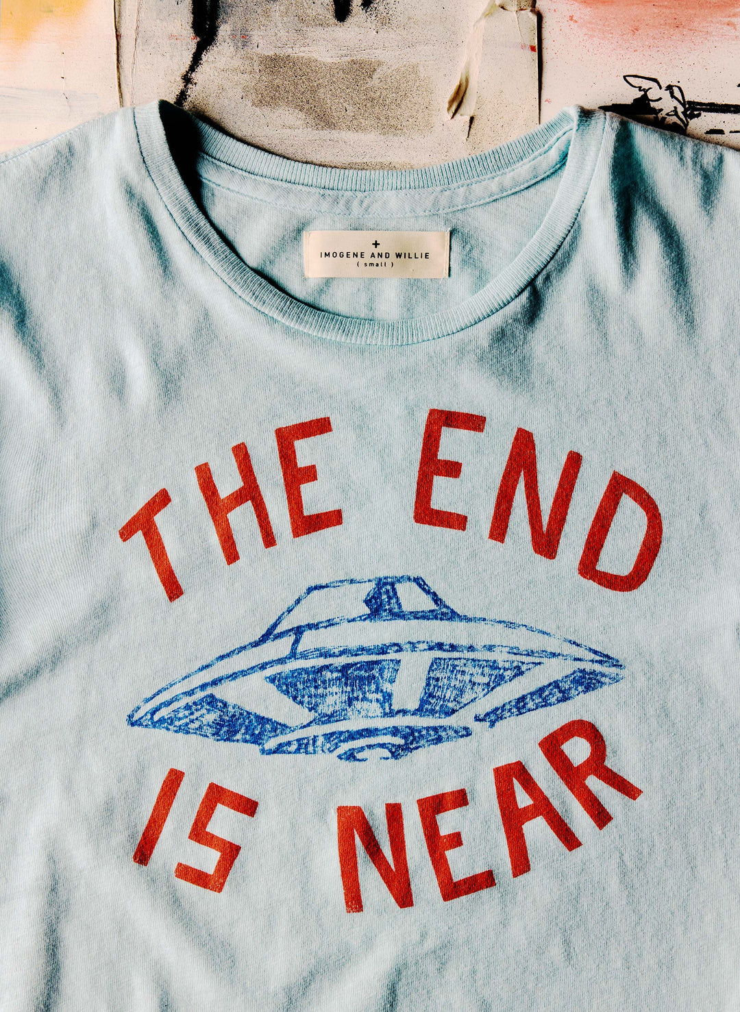 a t-shirt with a ufo on it