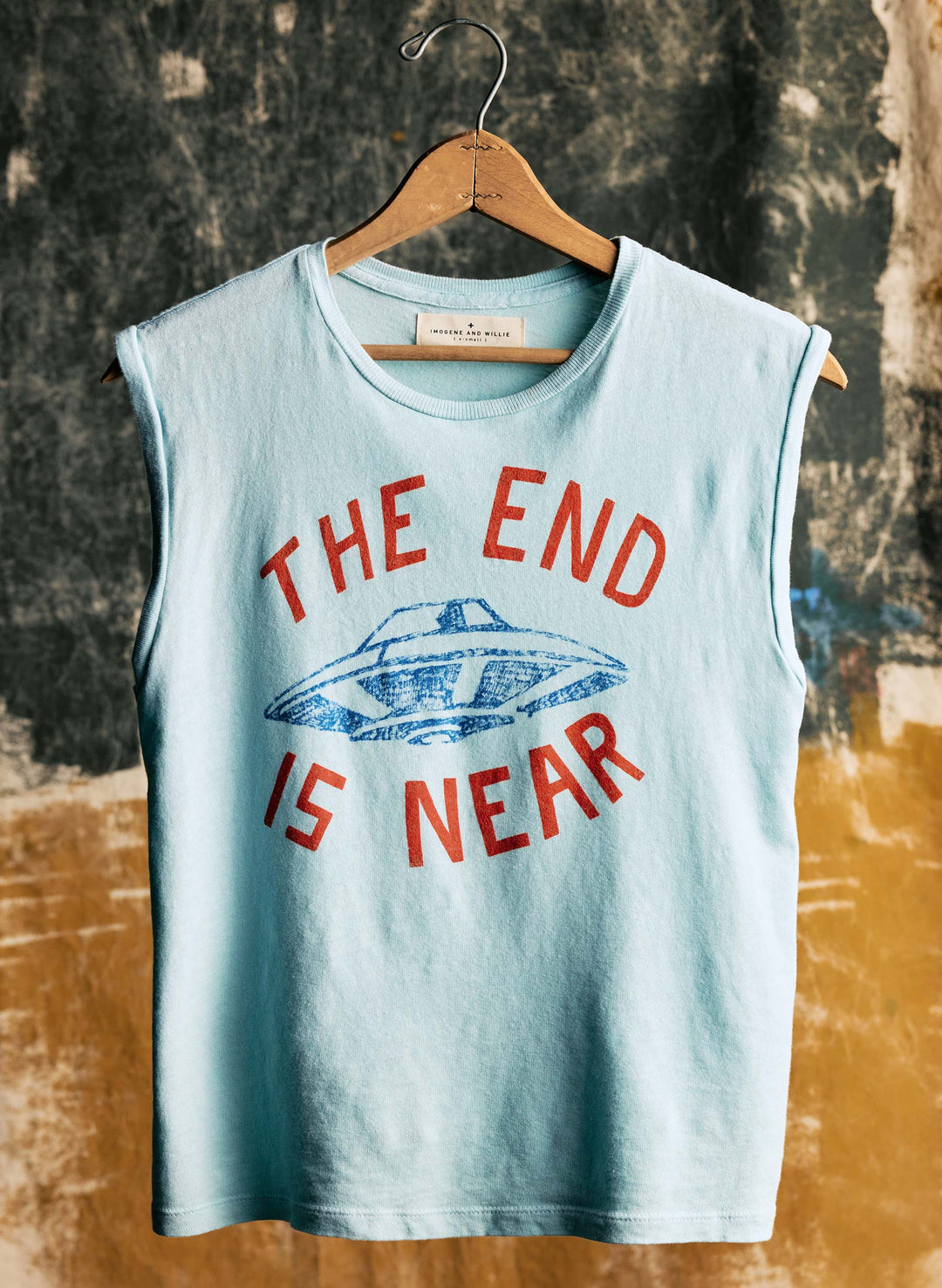 a blue tank top with a ufo on it