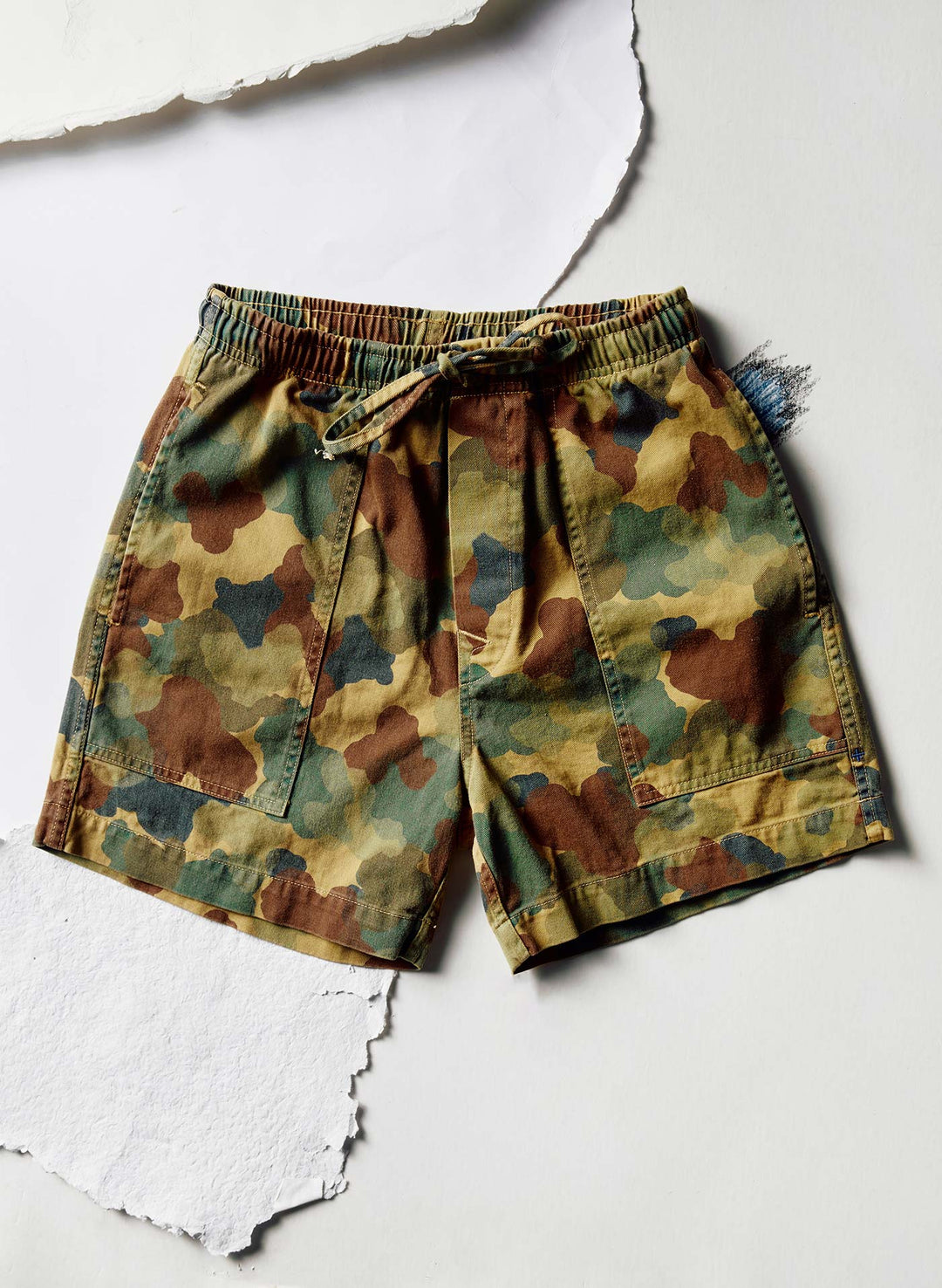 a camouflage shorts on a white surface