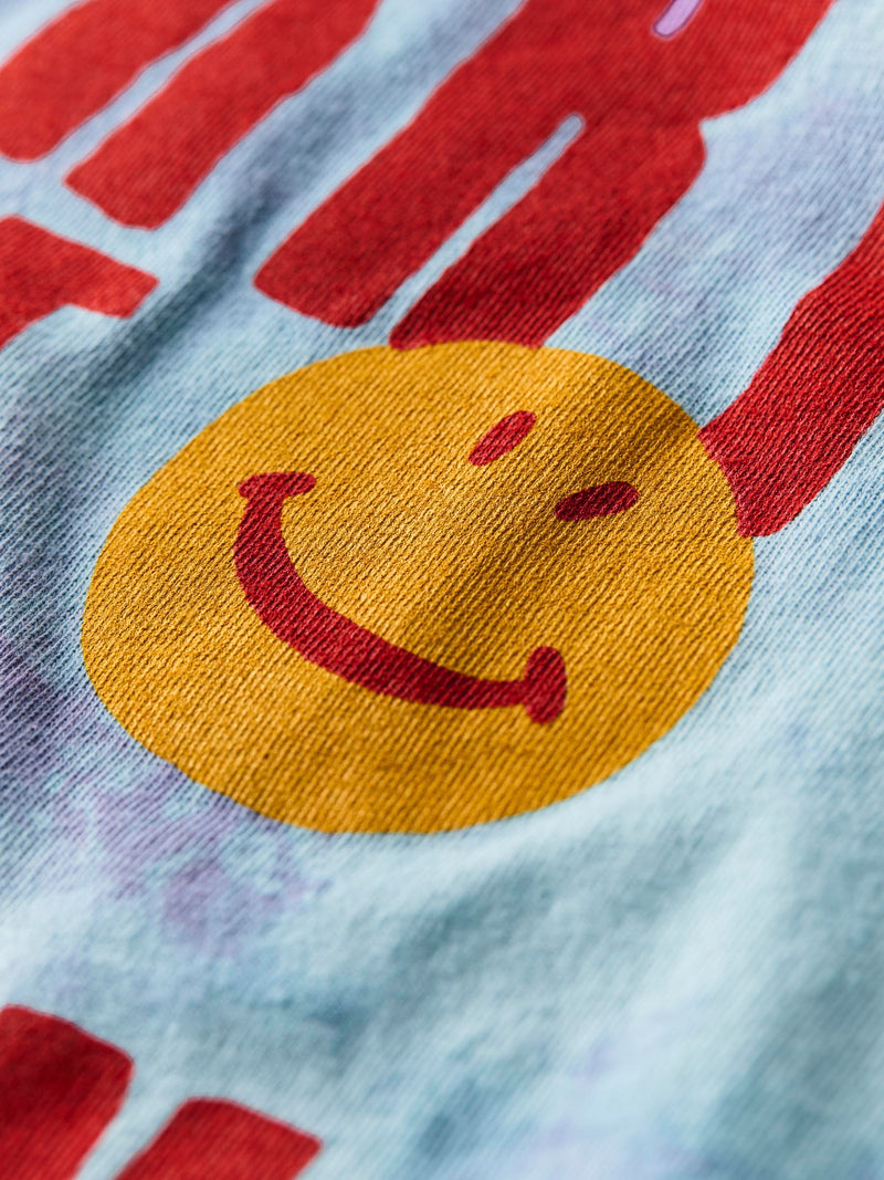 the "be happy" tee