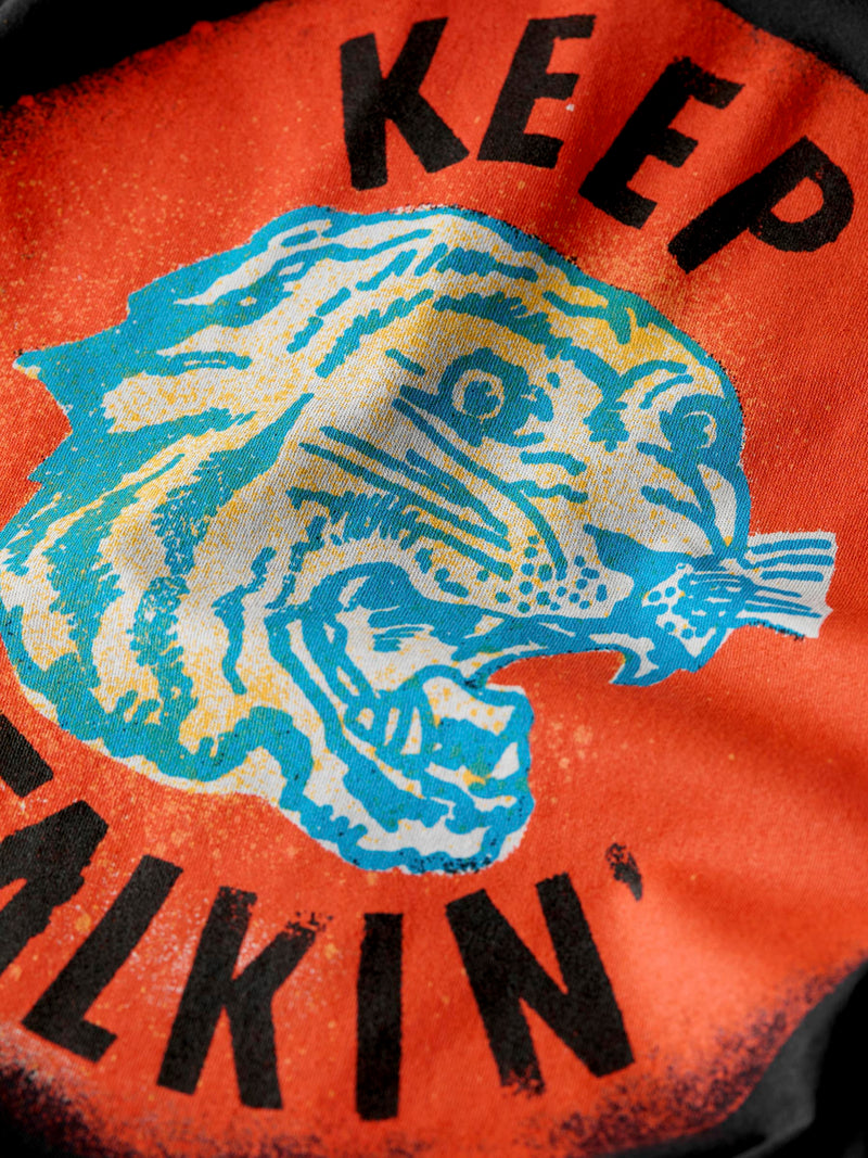 the “keep talkin” tee