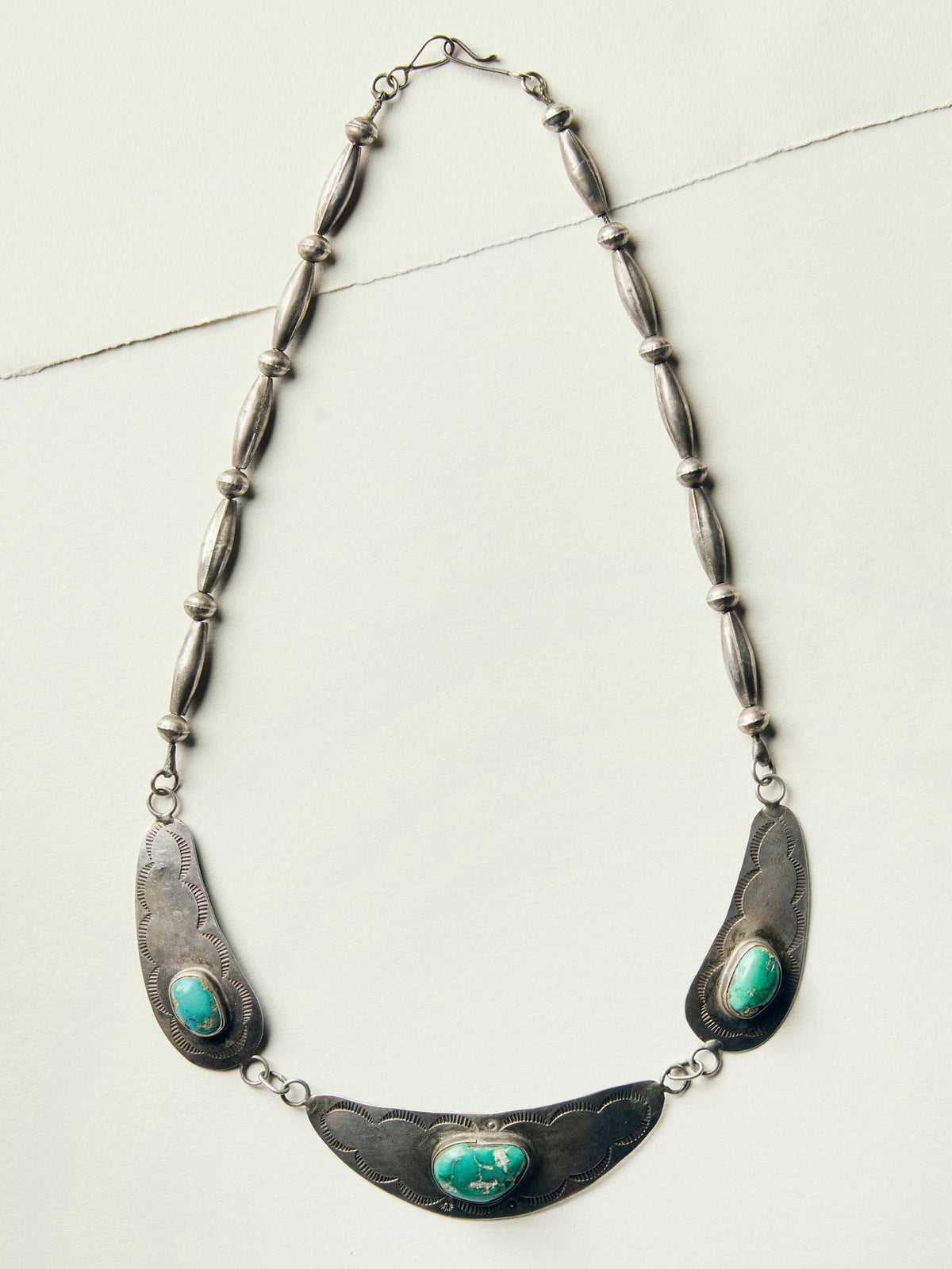 sterling harvey-era navajo shield necklace