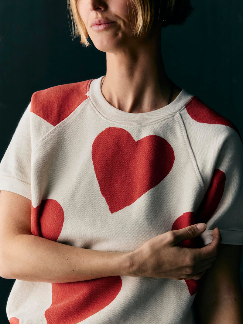 s/s "hearts all over" raglan sweatshirt