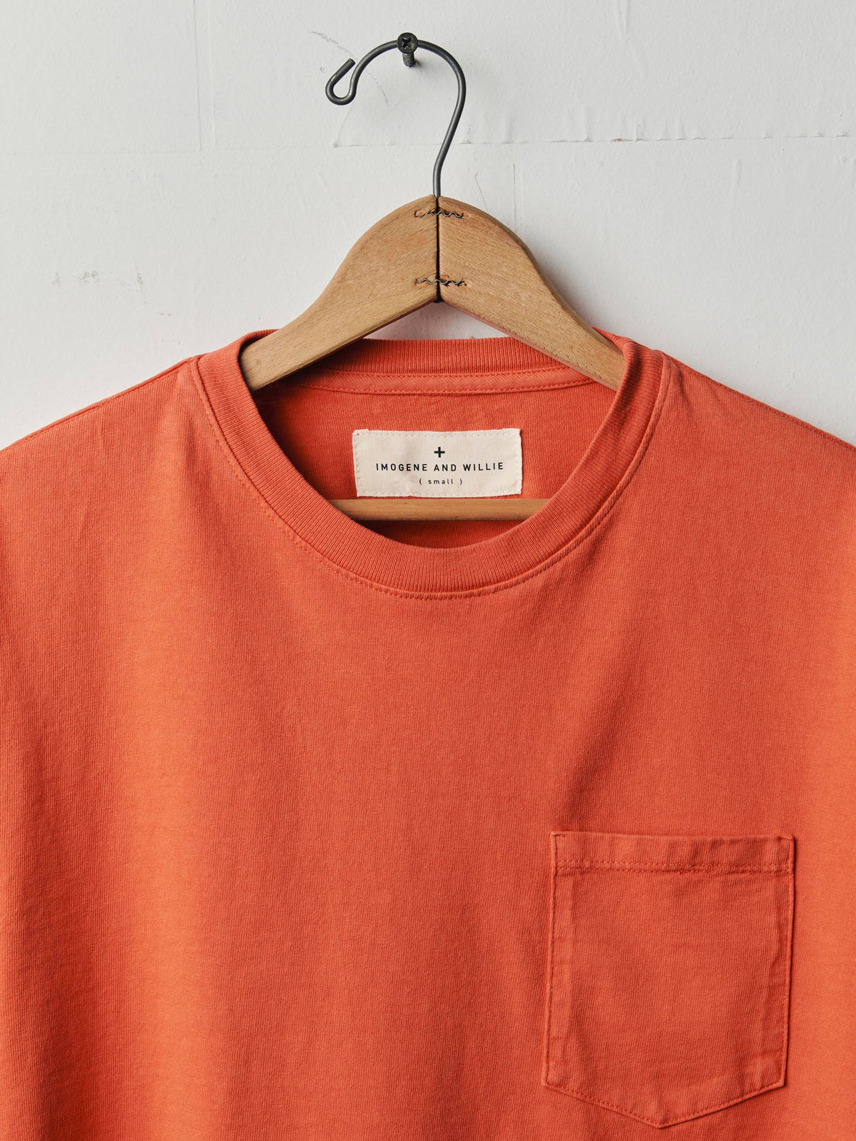 long sleeve pocket tee in faded orange