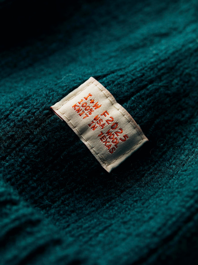 knit wool watch cap in teal - Model