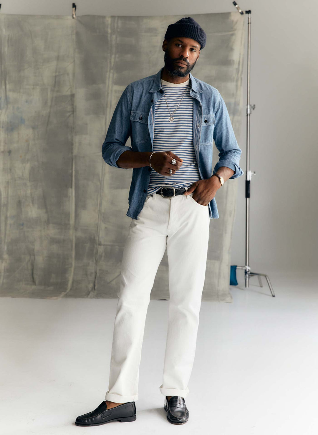 a man standing in a studio